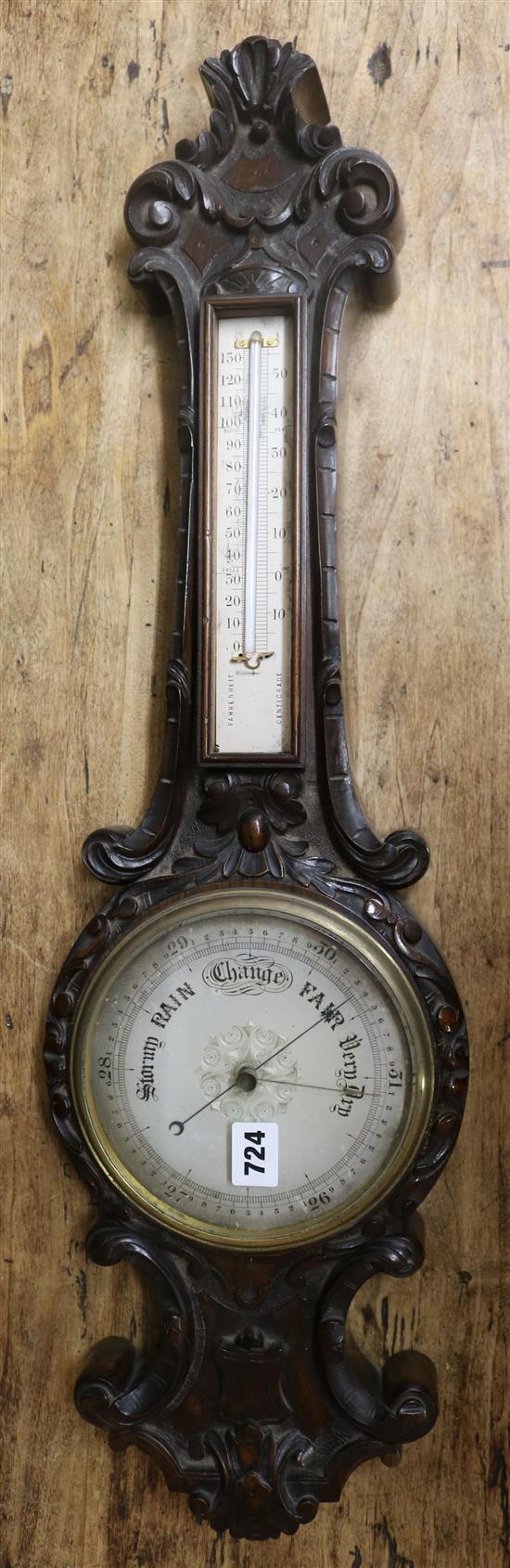 An Edwardian walnut aneroid barometer 75cm